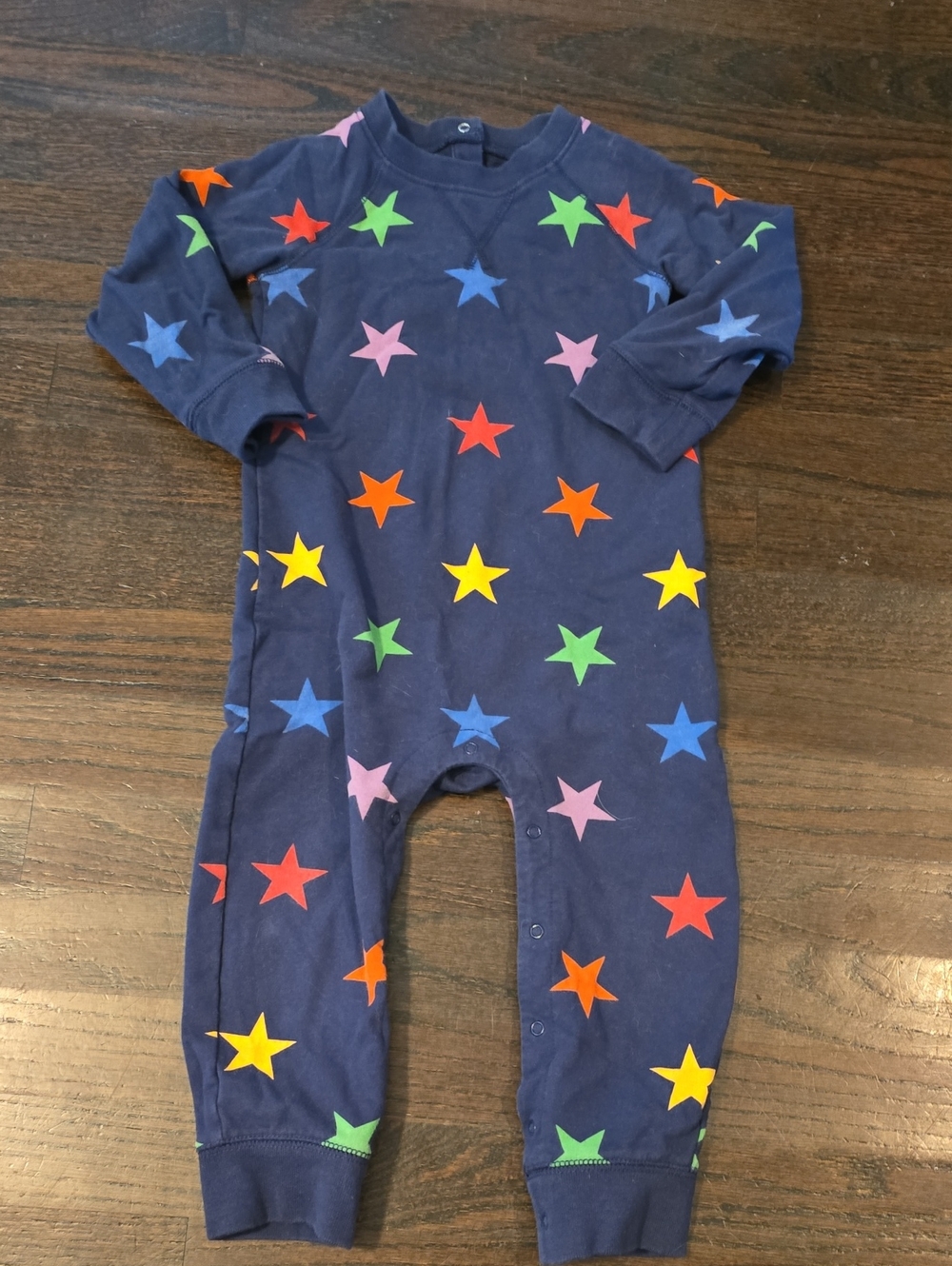 Primary Navy Footed One-Piece with Multicolor Stars